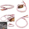 Bracelets de charme Naturel Madagascar Rose Quartz Bracelet tressé pour femmes Couleur Corde Tibétain Bouddhiste Perles Chanceuses À La Main 8mm Drop Dh5Sa