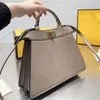 2023 Mini bolso de 4 colores Top diseñador de lujo Crossbody Bolsos de hombro Bolso de moda para mujer bolsos de cuero bolso al por mayor correa de hombro extraíble