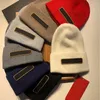 Moda tasarımcısı erkek kadınlar şapka kış şapka düz renk üst lüks sıcak yün kaşmir örme baş kapak