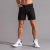 ランニングショーツサマーマンクイックドライジムスポーツショートパンツフィットネスジョギングポケット男性トレーニングカーゴパンツジムウェア
