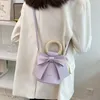 Designer kvinnors väska ny fransk båge crossbody väska mode textur vit bärbar hink väskor