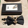 Noeuds papillon comme cadeau mode fait à la main rétro doré tête d'elk conception créative cravate noire/fête mariage boîte emballage 1 pc