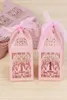 50pcs Hohlvogel -Stil Hochzeitsbevorzugt Candy Boxen Geschenkboxen mit B￤ndern Pink Purple Red White1307080