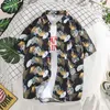 Camisas casuais masculinas masculinas havaianas folhas tropicais estampadas de lapela de lapela de manga curta