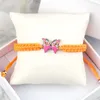 Braccialetti a maglie Corda con ciondoli per ragazze Bracciale con corda intrecciata fatta a mano con farfalla rossa rosa Braccialetti regolabili Regali di gioielli per amicizia