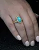 Br￶llopsringar Diamond Inlaid Hollow Oval Light Blue Stone Ring Fashion Luxury Gold Plated Ladies Temperament Accessories