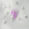 Tırnak Sanat Süslemeleri 50pcs/Lot Parlak Beyaz Gümüş Kar Tanesi Pullu Noel Alaşımlı Rhinestone Manikür Lehçe Süsleme Mücevher