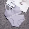 مجموعة صدرية مجموعة صدرية أنثى مجموعة ضد النساء اللياقة البدنية Seamless Thongs دعوى مثيرة الدانتيل ملابس داخلية BH