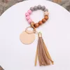 Llavero de silicona Pulsera con cuentas Wrislet Llavero Casa portátil Coche Llaves Titular Muñeca para mujer Brazalete Llaveros lindos Cadenas Niñas con borla de cuero ss1227