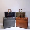 Luxurys Designers Sacs épaule haute qualité sac à provisions en cuir matériel ambre double poignée grande capacité letter290R