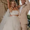 2023 Tv￥ stycken Boho A Line Wedding Dresses Pleats Tiered kjol Stroppl￶s ￤rml￶s Long Beach elfenben Tulle brudkl￤nningar domstolst￥g bakknappar sexig sommar vestido