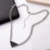 Luxur Designer Halsband Silver Rope Chain Womens Halsband Triangel Pendant Design Party Hip Hop Punk Halsband för Mens Names STA3978326