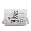 Schoudertassen vrouwen graffiti crossbody square tas mode pu lederen riem gesp gesp. Contrast kleur flap messenger