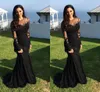Aftonklänningar Sexiga arabiska juvelhalsar Illusion Spetsapplikationer Kristallpärlor Svart sjöjungfru långärmade Formell festklänning Balklänningar