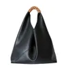 Niche Design Cowhide Handtas Fashion Joker Minimalistische stiksel geweven schoudertas Geometrische oksel Tote Bag217Y