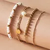 Braccialetti con ciondoli HuaTang 4 pezzi Boho Strand Bead Set di braccialetti con ciondolo di perle per le donne Ciondoli con paillettes multistrato Gioielli femminili regolabili