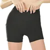 Активные шорты дышащие сжатие спортивные женщины карманные карманные тренировочные тренажерные тренажеры.