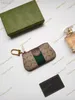 Nova carteira zero Bolsa de luxo de luxo Moda de couro Bordado Padr￣o PVC Splice Key Bag