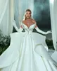 Elegant bollklänning bröllopsklänningar applikationer v nack ärmlösa paljetter pärlor diamanter rufsar kändis golvlängd lyxformella klänningar brudklänningar plus storlek
