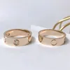 Anel de designer titânio aço prata amor anéis homens e mulheres rosa ouro jóias casais anel de natal presente festa de casamento accessori300v