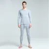 Ropa interior térmica para hombre, conjunto de invierno, traje largo de Color sólido sin costuras, Tops cálidos con cuello redondo, pantalones, 2023