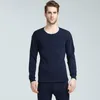 Ropa interior térmica para hombre, conjunto de invierno, traje largo de Color sólido sin costuras, Tops cálidos con cuello redondo, pantalones, 2023