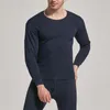 Sous-vêtement thermique pour hommes couleur unie pour hommes avec épaississement hiver mode mince automne chaud vêtements et pantalons doux col rond ensemble