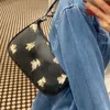 Shoulder Bags 2022 New Cute Designer Baby Teri Dog Underarm PVC Old Flower Coating One Crossbody Small Square