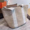 Woody Straw Totes Women Bucket Bag Fashion Luxurys Designers Basket Handväskor Summer Beach Stora tygväskor axelväska 2021171T