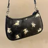 Shoulder Bags 2022 New Cute Designer Baby Teri Dog Underarm PVC Old Flower Coating One Crossbody Small Square