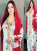 Abbigliamento etnico Abito stampato musulmano Abiti a costine in pizzo mediorientale Tessuto fresco e liscio Gonna fluente con fiori rossi da donna di Dubai