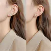 Dos boucles d'oreilles mode creux pleine perceuse femmes papillon asymétrique oreille os Clip bijoux