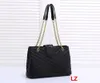 diseñador de la marca moda mujer bolsos de mano bolsos de hombro bolsos de diseño Charol de alta calidad Famosos bolsos clásicos Bolso de moda para mujer Bolso grande 3504