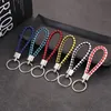 Mélanger la couleur PU cuir tressé tissé porte-clés corde anneaux Fit bricolage cercle pendentif porte-clés titulaire voiture porte-clés bijoux accessoires