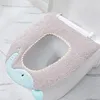 Cubiertas de asiento de inodoro Almohadilla de baño suave Calentador de taburete Gatito de dibujos animados Cubierta de invierno Cojín para prevenir el frío