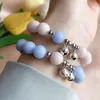 Link Armbanden Lumineuze roze blauwe glazen kralen bel voor vrouwen kristal kralen charmes armbanden elastische creatieve sieraden geschenken