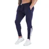 Herrbyxor manliga jogging män sport tröjor som kör fitness joggers spårbyxor smala fit bodybuilding byxor