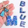 Porte-clés Mode Acrylique Lettre Porte-clés Avec Papillon Bleu Pendentif Coeur Paillettes Rempli 26 Initiales Porte-clés Pour Femmes Sac À Main Décor