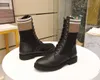 2023 botas de motorista de cuero negro Rockoko de diseñador de lujo para mujer con tejido elástico para mujer, botas tobilleras de combate, zapatillas de calcetín con suela de goma
