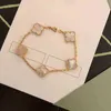 Fashion classique 4 / quatre feuilles Clover Bracelets charme chaîne bracele Gold Agate Shell nacre de nacre pour femmes Girl Wedding