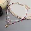 Kedjor Summer Beach Style White Beaded Choker Multicolor P￤rlor Halsband f￶r kvinnor Golden Lock Emamel Flower Bead Halsband Boho smycken