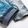 Mäns jeans män trycker jeans streetwear bokstäver Lightning målade stretch denim byxor vintage blå rippade knappar fluga smala avsmalnande byxor t221102