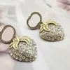 Women Ear Studs Designer örhängen Kvinnor Bokstäver Hjärtdesigners smycken diamanter örhänge Strawberry Accessories Ladies Casual D2211024F
