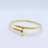 Luxury Glamour Ladies Armband Classic Nail Bangle Unisex Valentine039S Day Wedding Present 18K Guldsmycken Rostfri Stee242i6879677