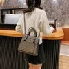 60% de réduction sur les sacs à main Nouveau sac cartable fourre-tout simple imprimé fronde design épaule unique sac pour femme Sac à main Black Friday