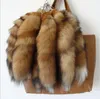 Keychains Real Fur Nyögringband Remkedja Passistpris Stor svans Tasselväska Tag kvinnor män Originalfärg charm a78