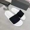 Mode luxe zomer sandalen strand sportschoenen ontwerper skateboard schoenen mannen en dames slippers tas bloem bedrukt lederen gaas rubber zwarte schoenen.