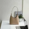 Bolsas de noite inser Super Fire Bag Women Fashion Trend Trend Portable ombro único PU textura PU Hand Niche Bucket