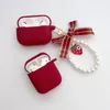 Nyckelringar Söt gitter Bowknot Strawberry Pearl Keychain för hörlurfodral Creative Cherry Pendant Key Rings Kvinnor Ryggsäck dekoration