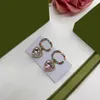 Designer Hoop Silber Rose Bolzen Ohrringe f￼r Frauen Luxurys Designer lieben Gold Ohrring Mode g Buchstaben Perlenohrring 2211035z